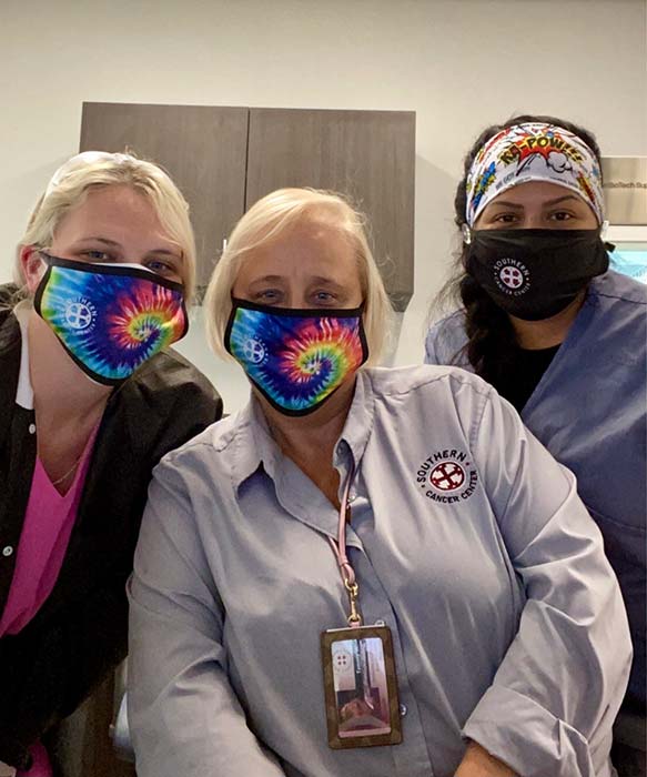 3 girls wearing masks